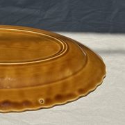 Antique oval dish, yellow-orange, frieze border L:24