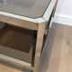 Pair of octagonal chrome side tables with tinted glass tops