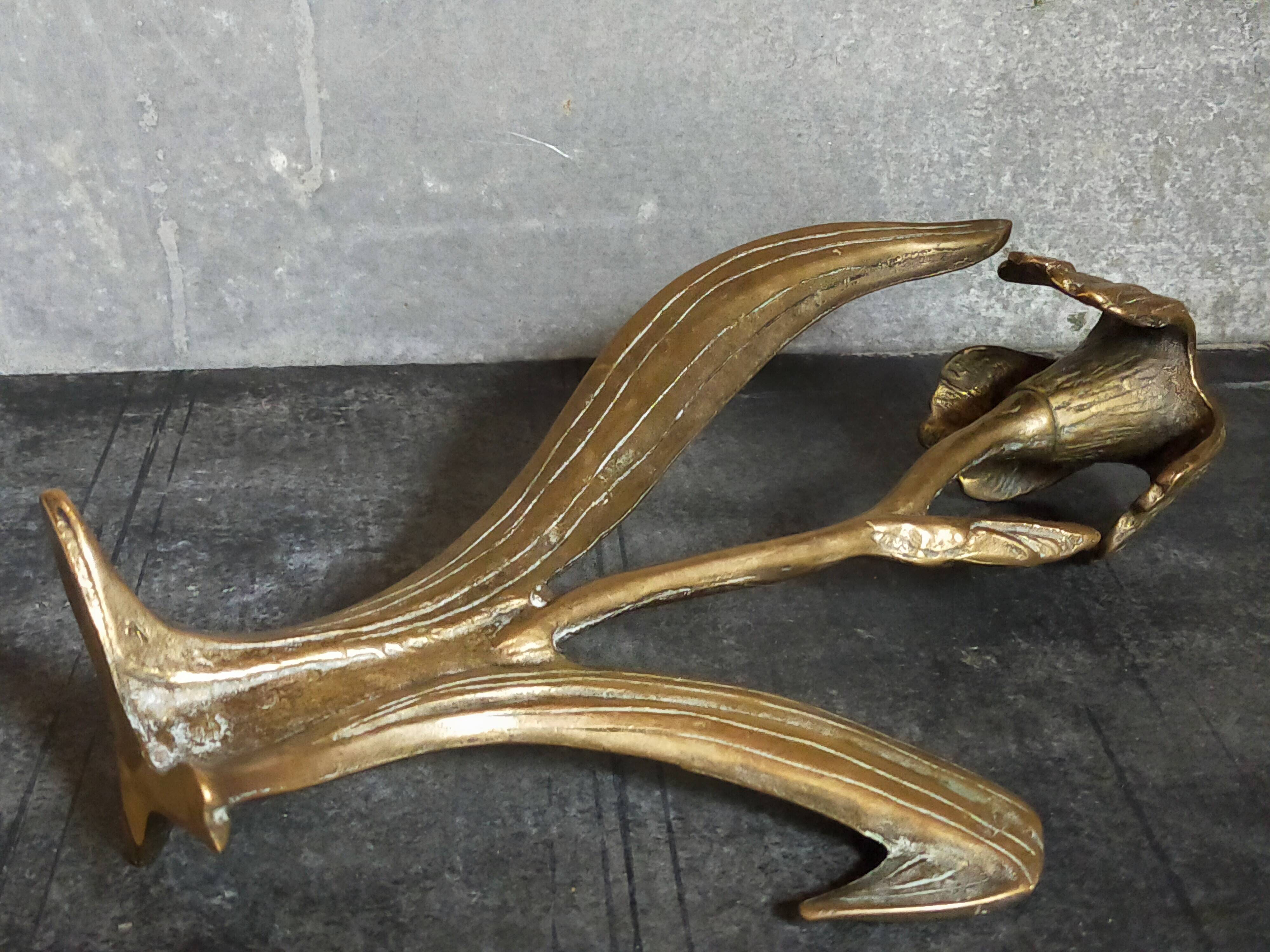 Old iris flower candle holder in solid brass