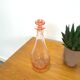 Carafe en verre rose vintage