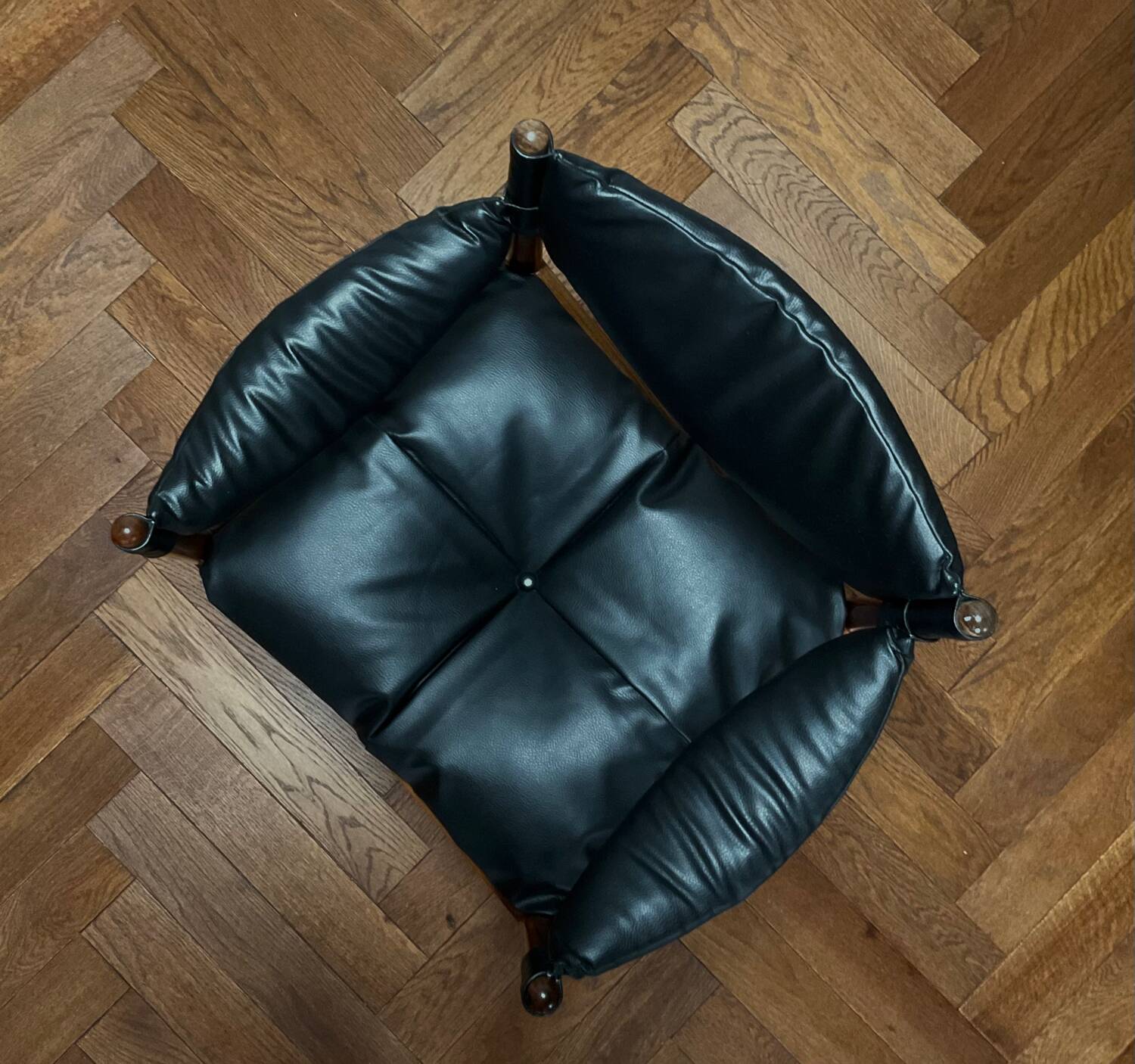 Chair with armrests by Kristian Solmer Vedel