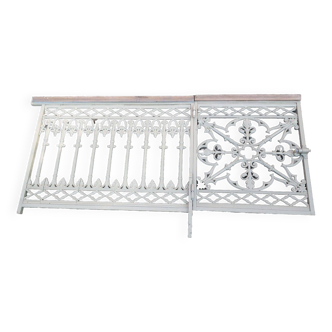 Grill with cast iron gate