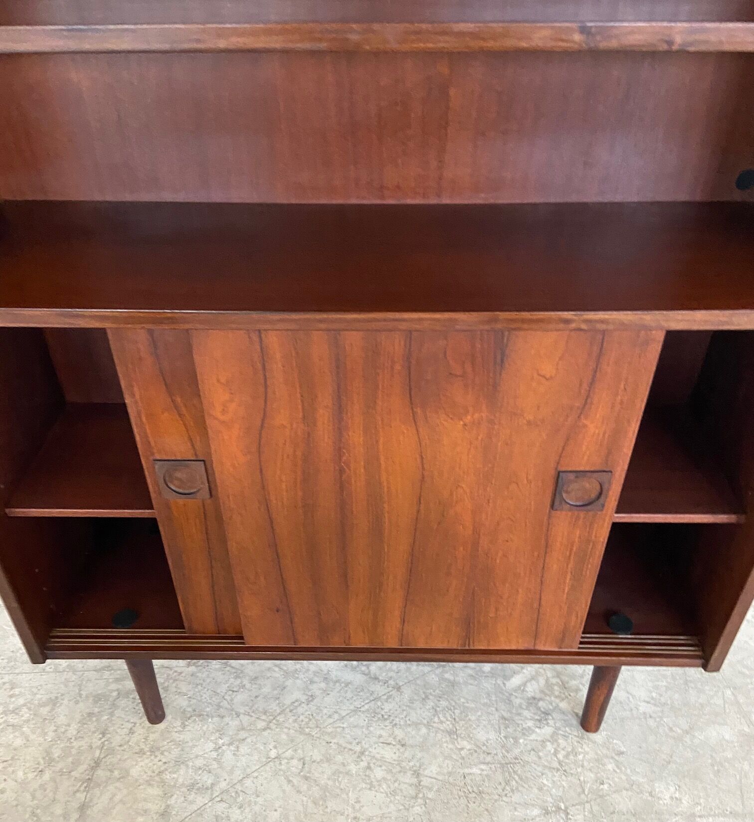 Danish retro vintage library in rosewood with sliding doors from the 1960s.