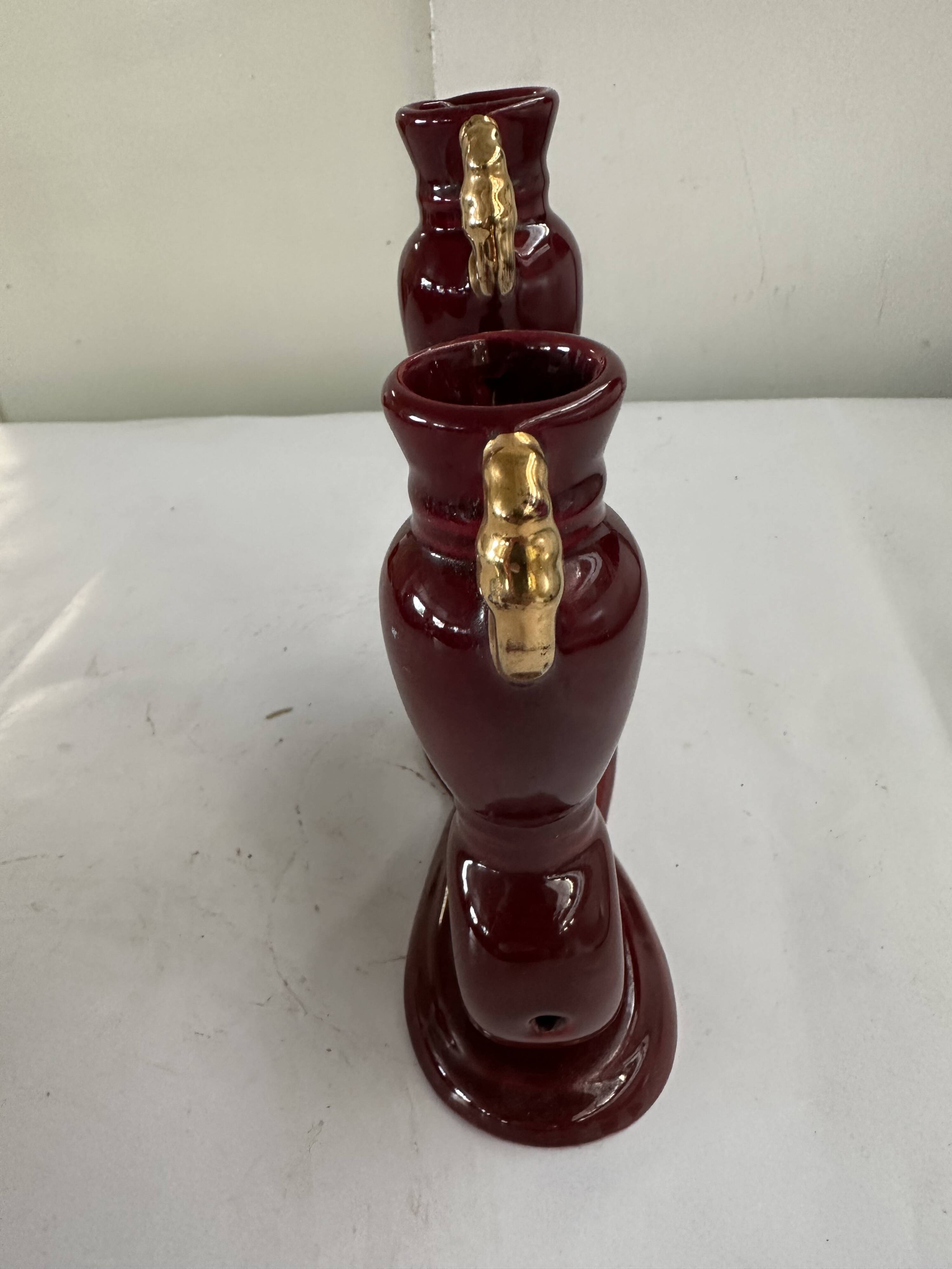 Bordeaux and Gold glazed earthenware candlestick attributed to Vallauris, 1950s