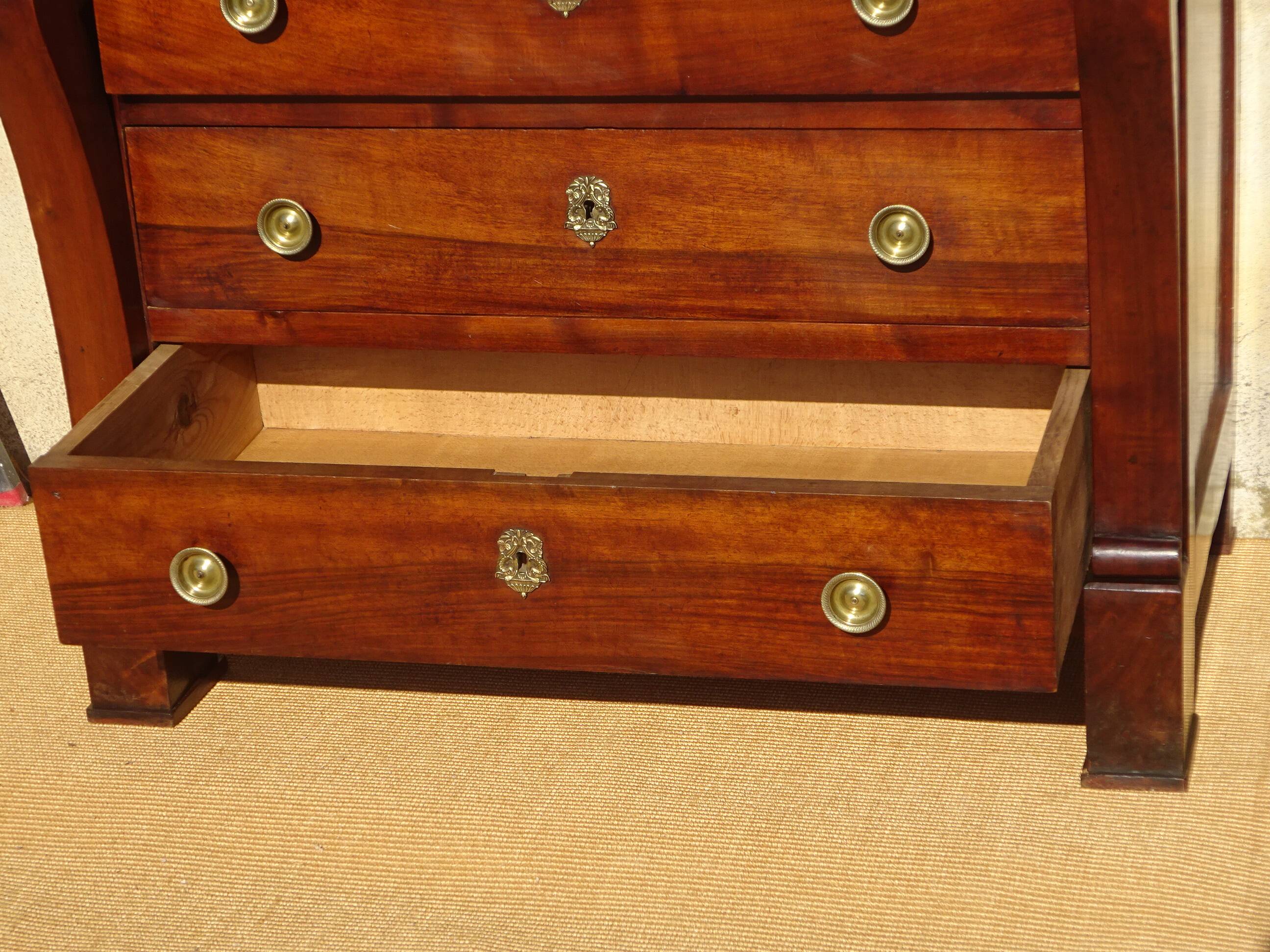 Very old walnut chest of drawers.