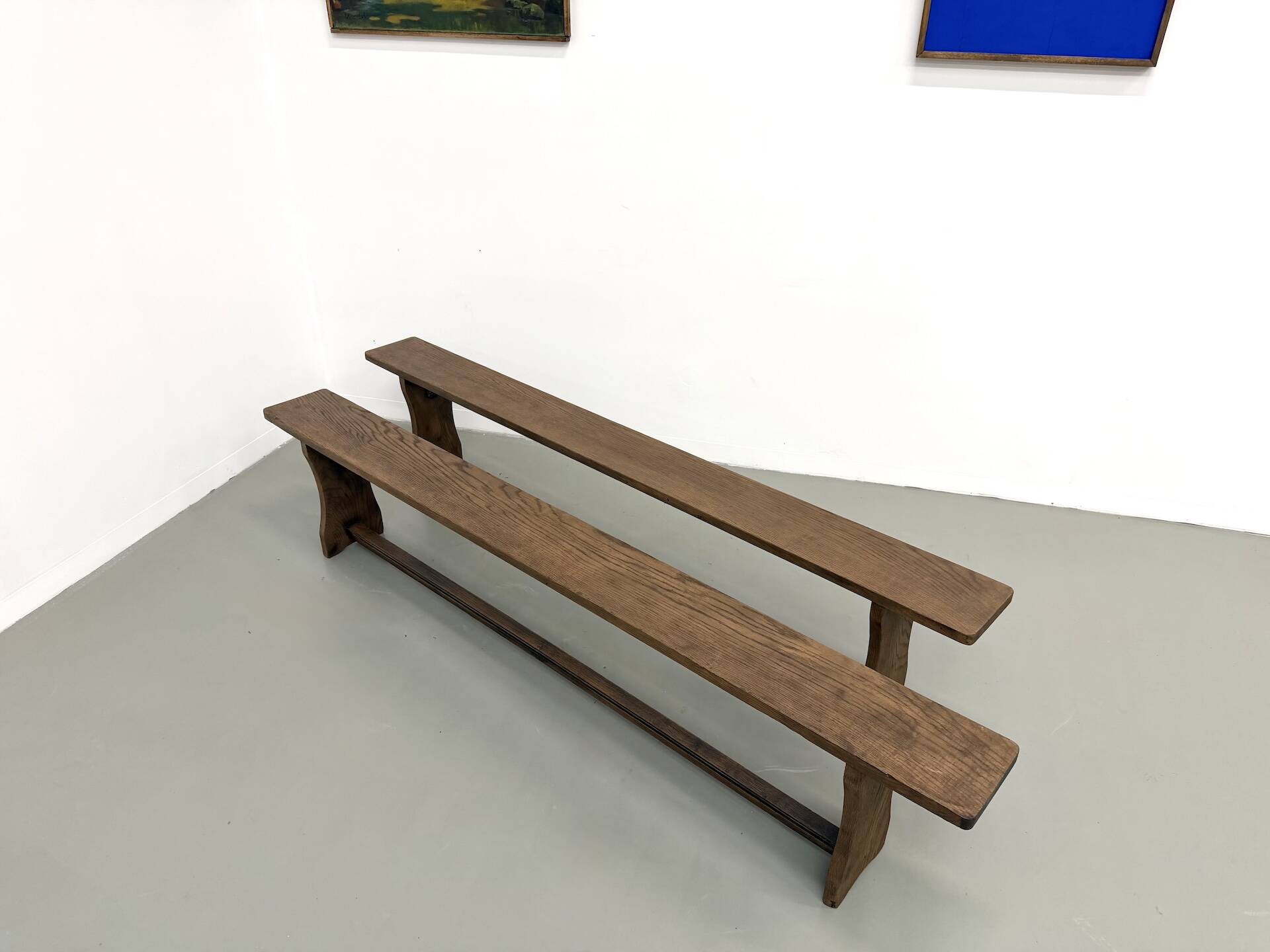 Pair of solid oak benches, winged legs, France, 1970s