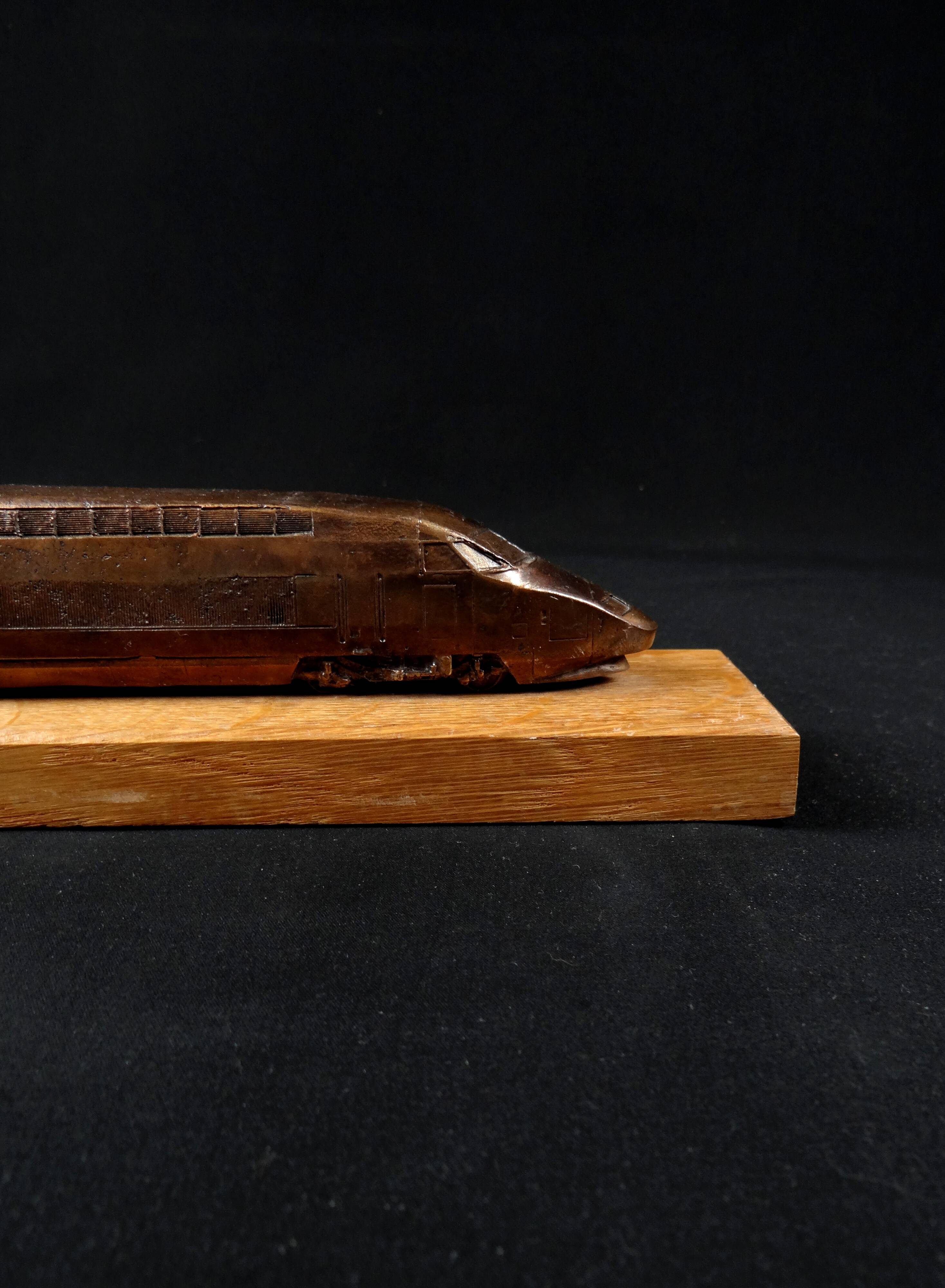Bronze TGV on a wooden base, scale model of the TGV Sud-Est from the 1980s