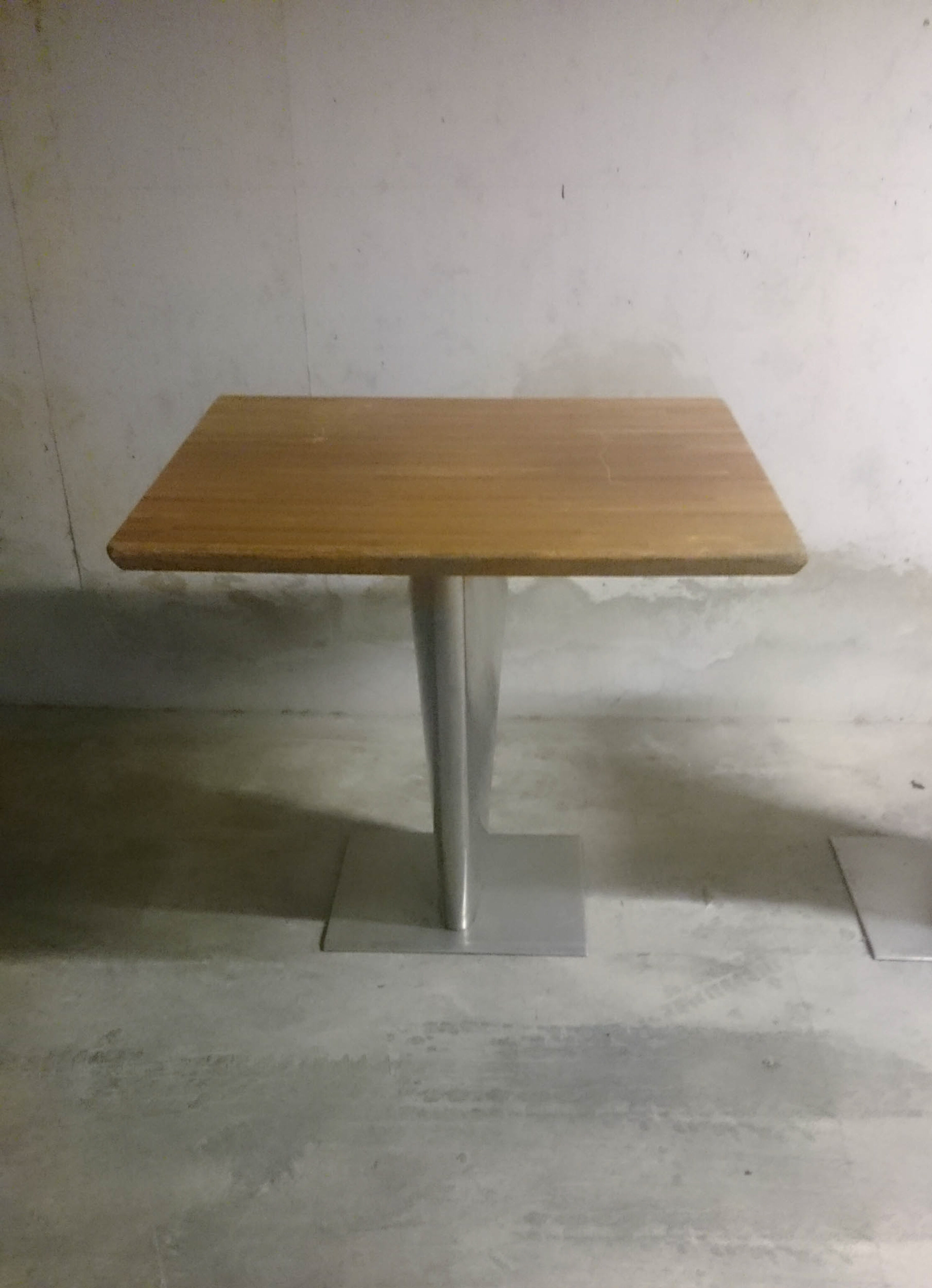 Pair of industrial metal foot tables and solid wood tray