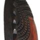 African wooden mask, face topped with a bird.