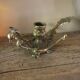 Brass candle holder cave rat peacock