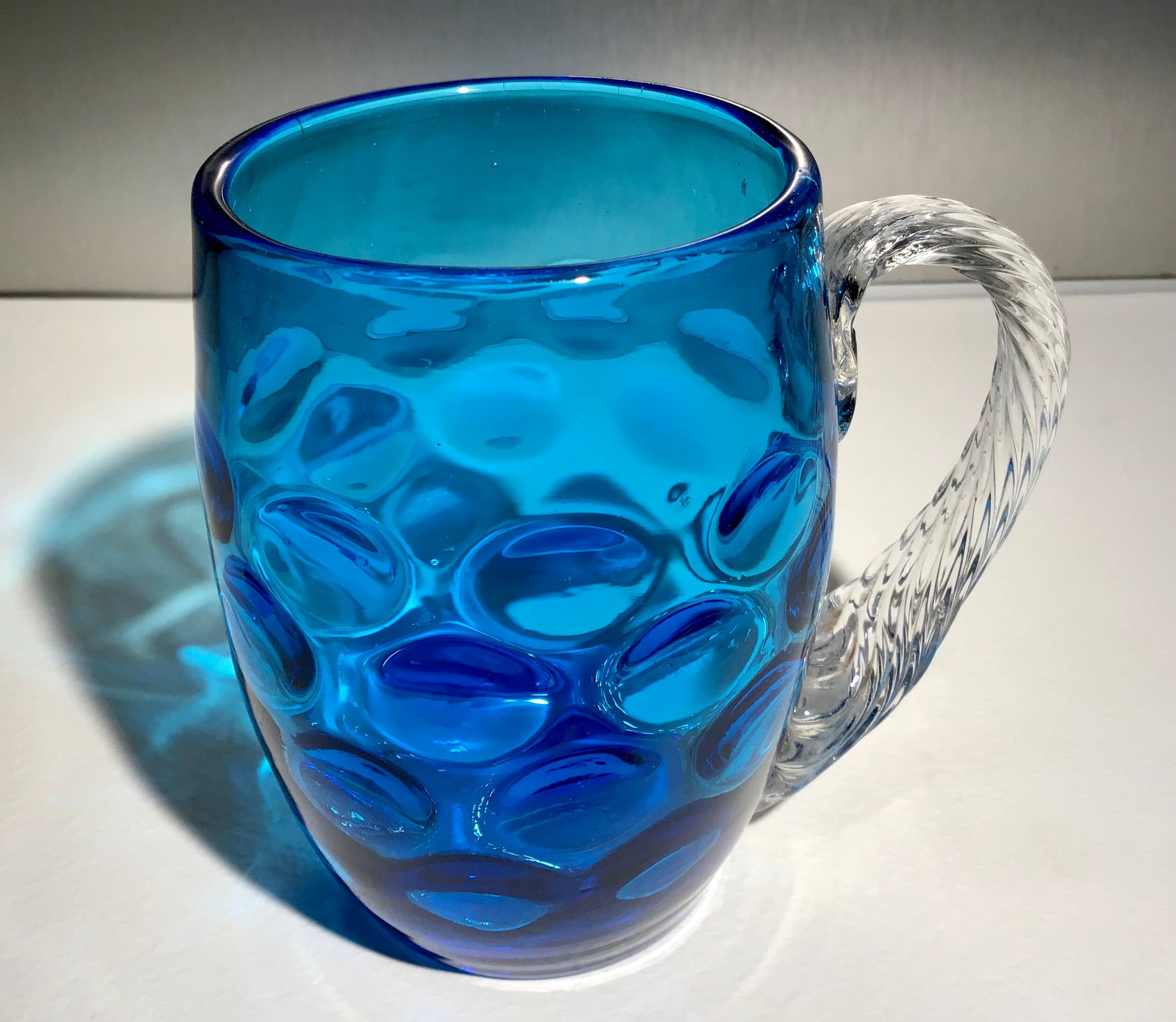 Two glass and crystal mugs, model of the Portieux crystal factory.
