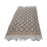 Traditional beige ethnic carpet with multi-coloured patterns  110x190cm