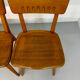 Set of 4 vintage solid oak chairs, 1960s design with sculpted backrest.