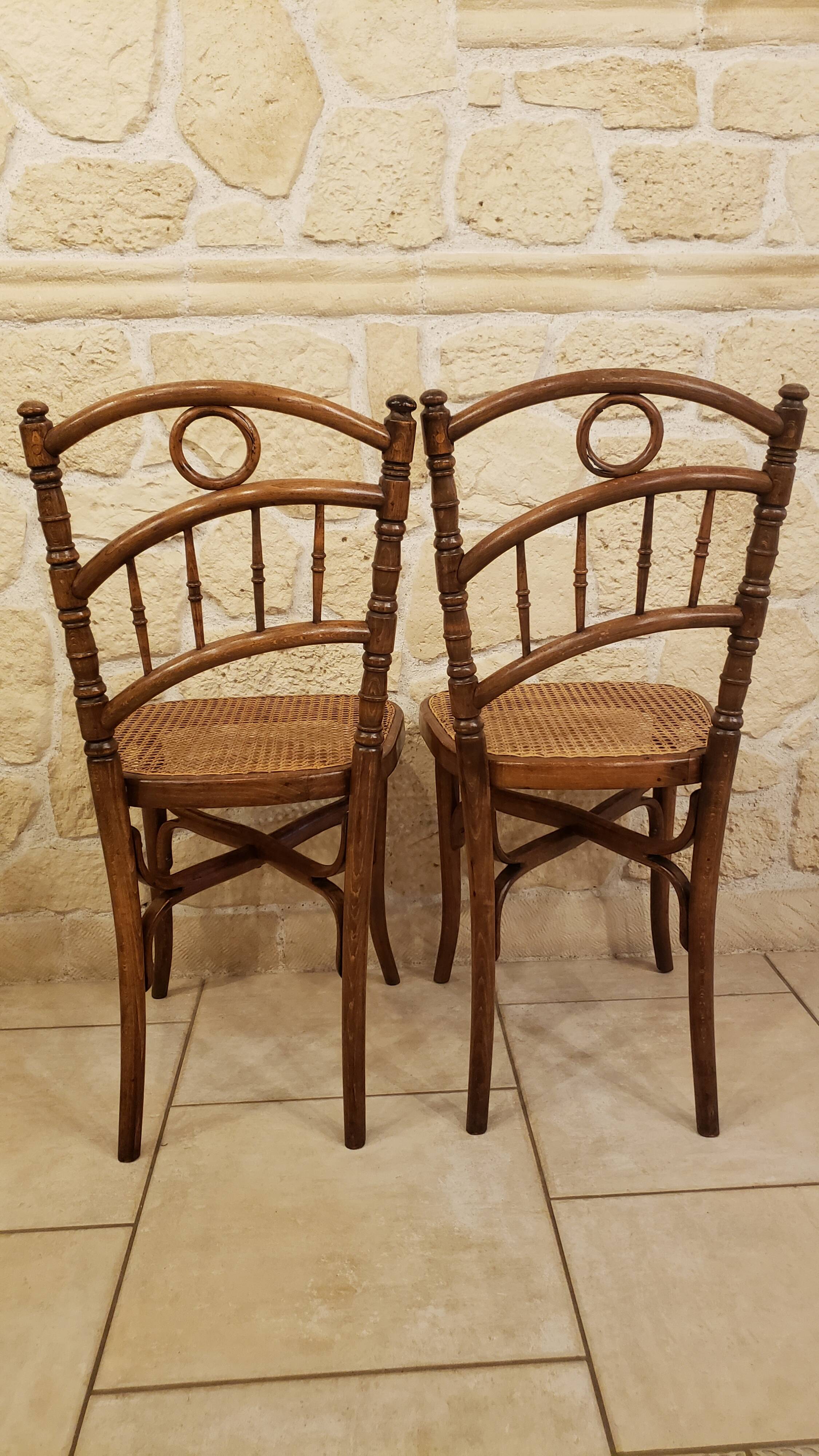 Pairs of old caned bistro chairs cambier n°229