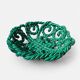 Large twisted green enamelled bowl