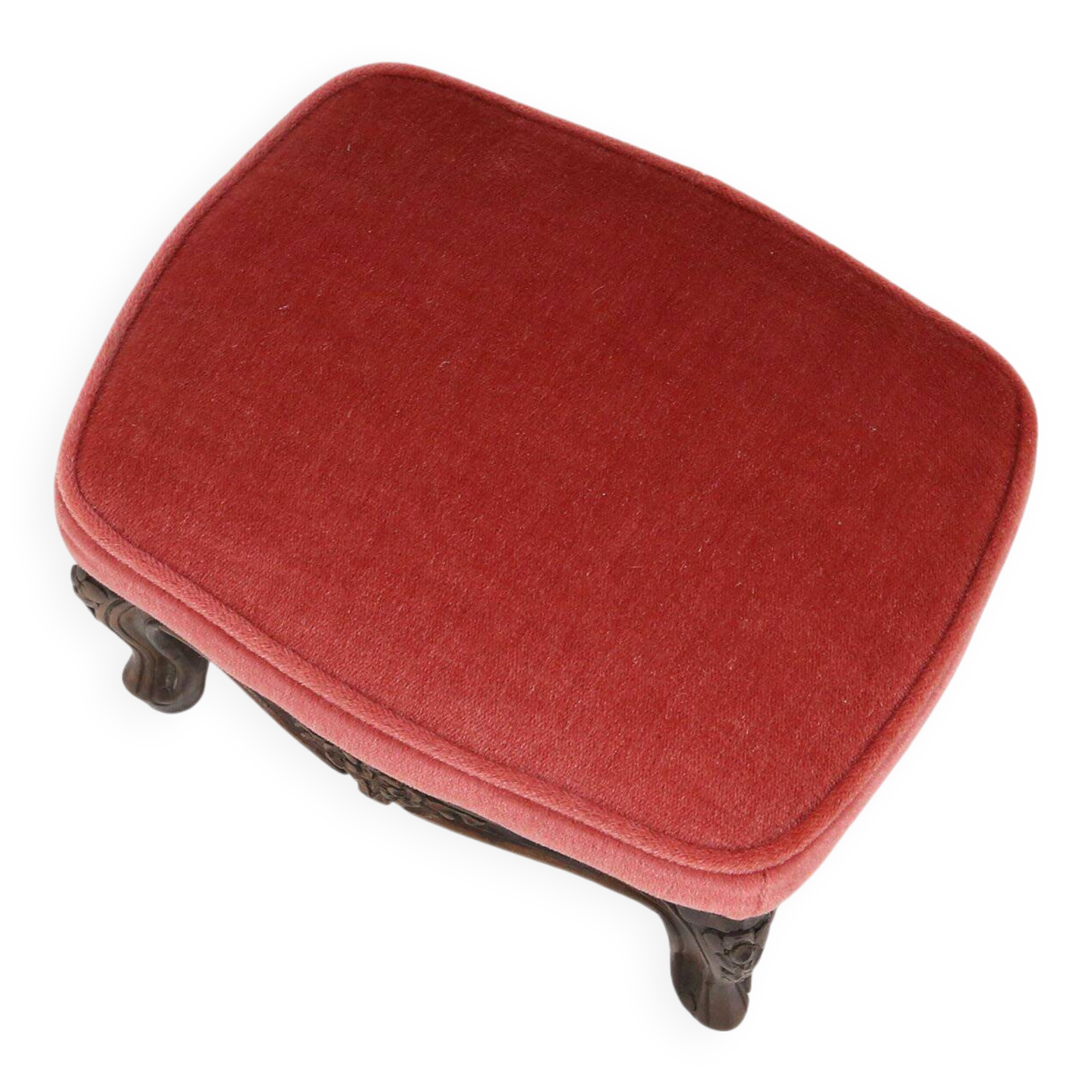 Baroque style foot stool in carved wood with coral velvet upholstery