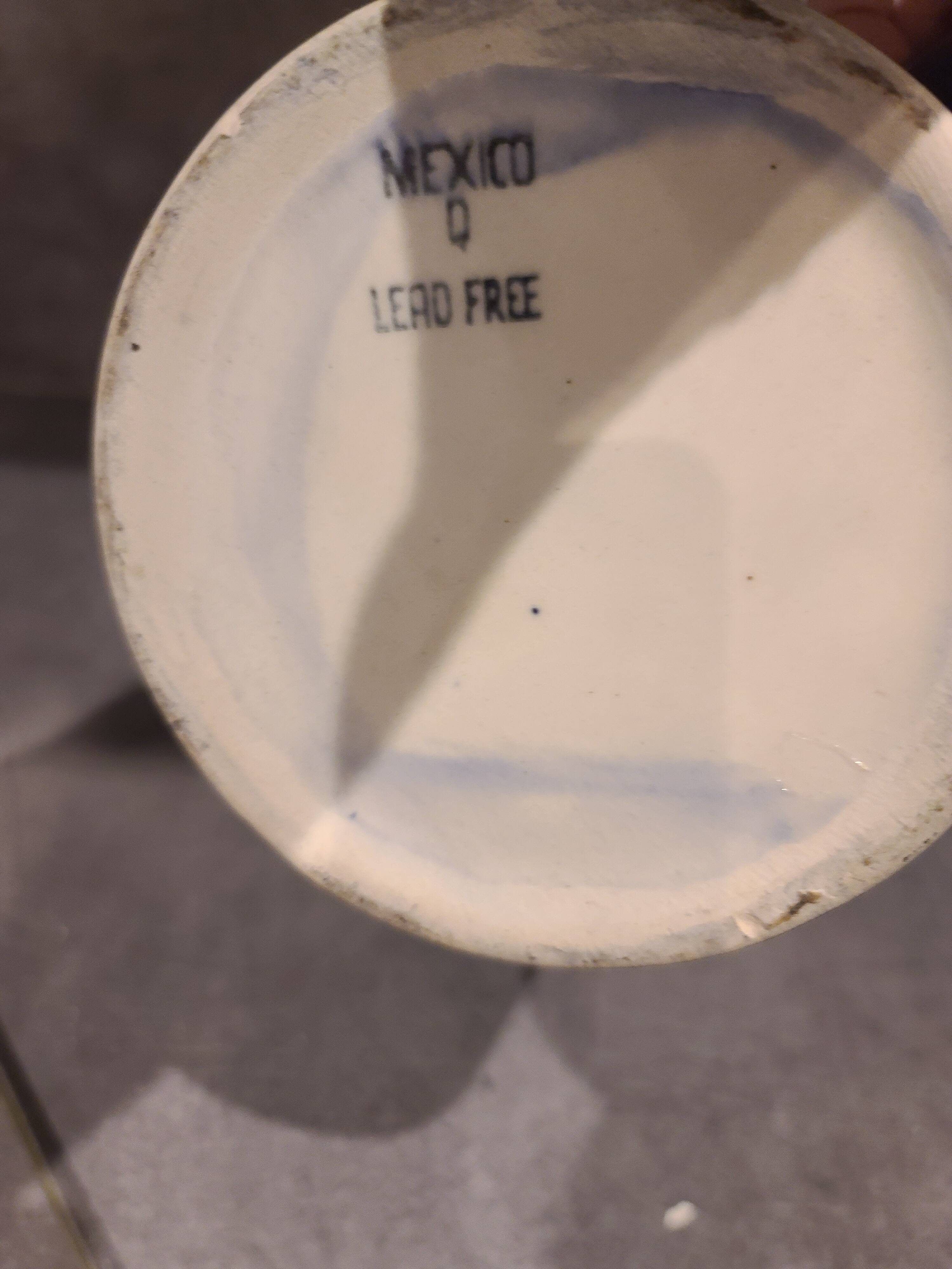 Ceramic pitcher with fruit and vine decoration - colorful rustic style