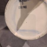 Ceramic pitcher with fruit and vine decoration - colorful rustic style