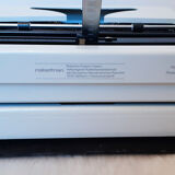 Portable, functional typewriter with user manual