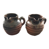 Pair of sandstone pitchers