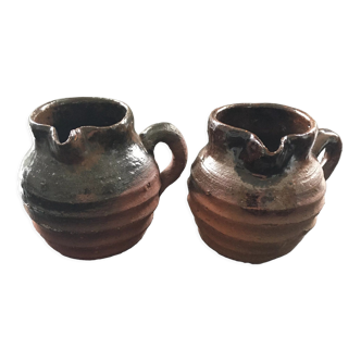 Pair of sandstone pitchers