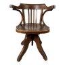 Baumann rotating wooden armchair