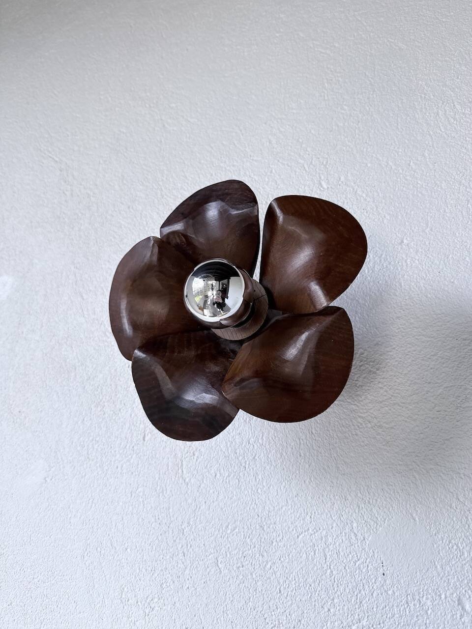 Pair of wooden flower wall lights from the 1970s.