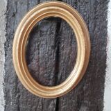 Small oval golden frame