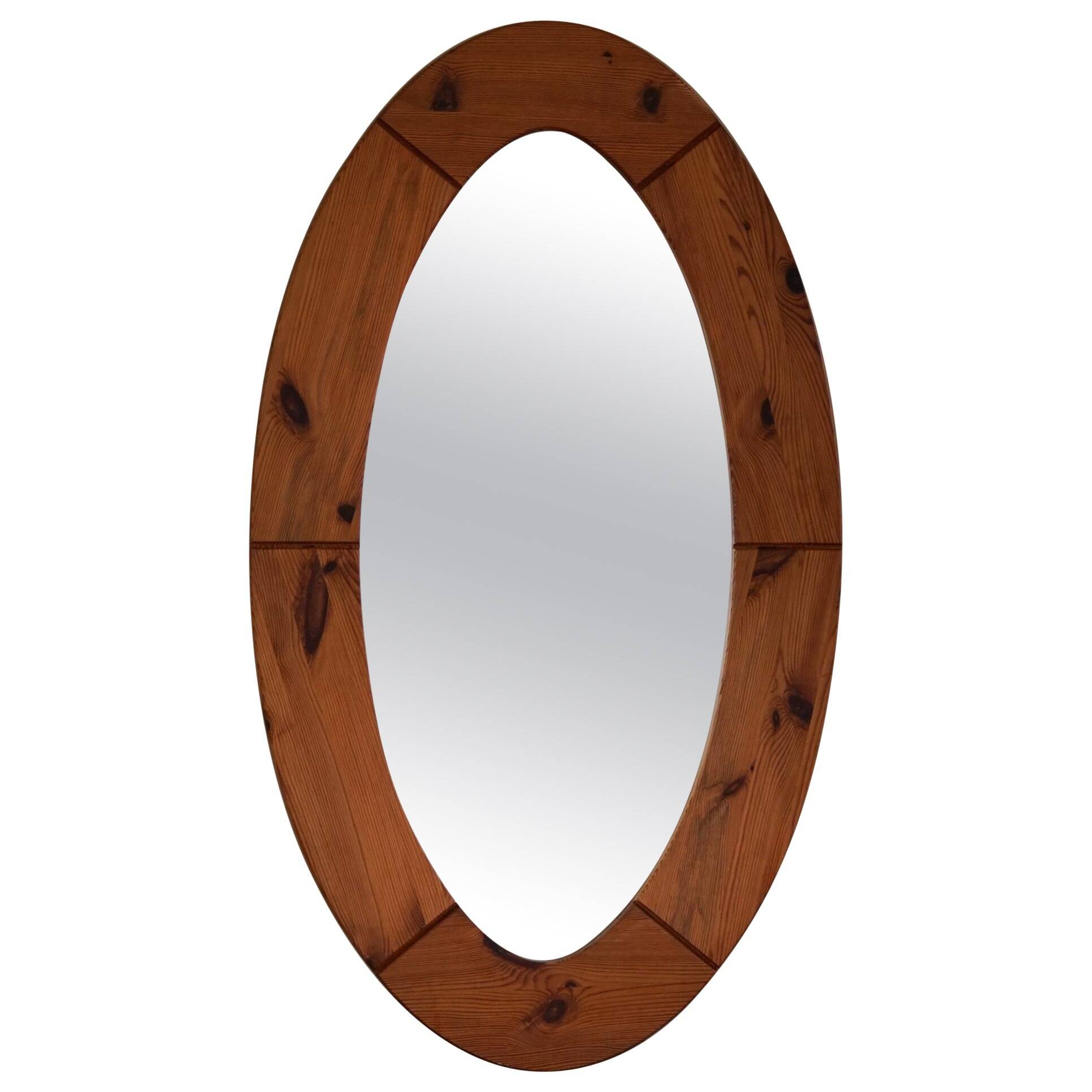Large oval wall mirror in solid pine by Glasmäster Markaryd, Sweden, 1960s.