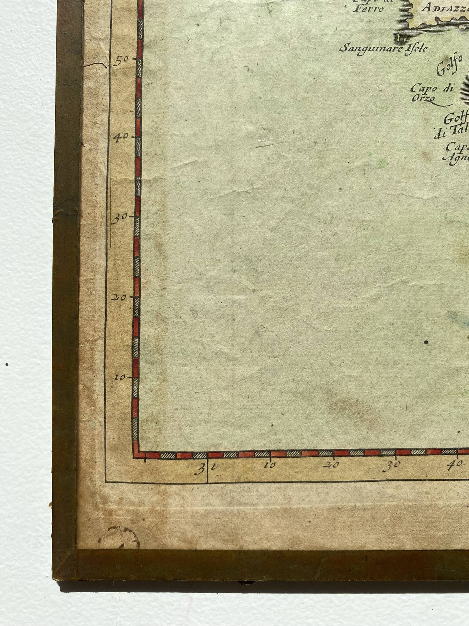 Old map of the Isle of Corsica framed under glass