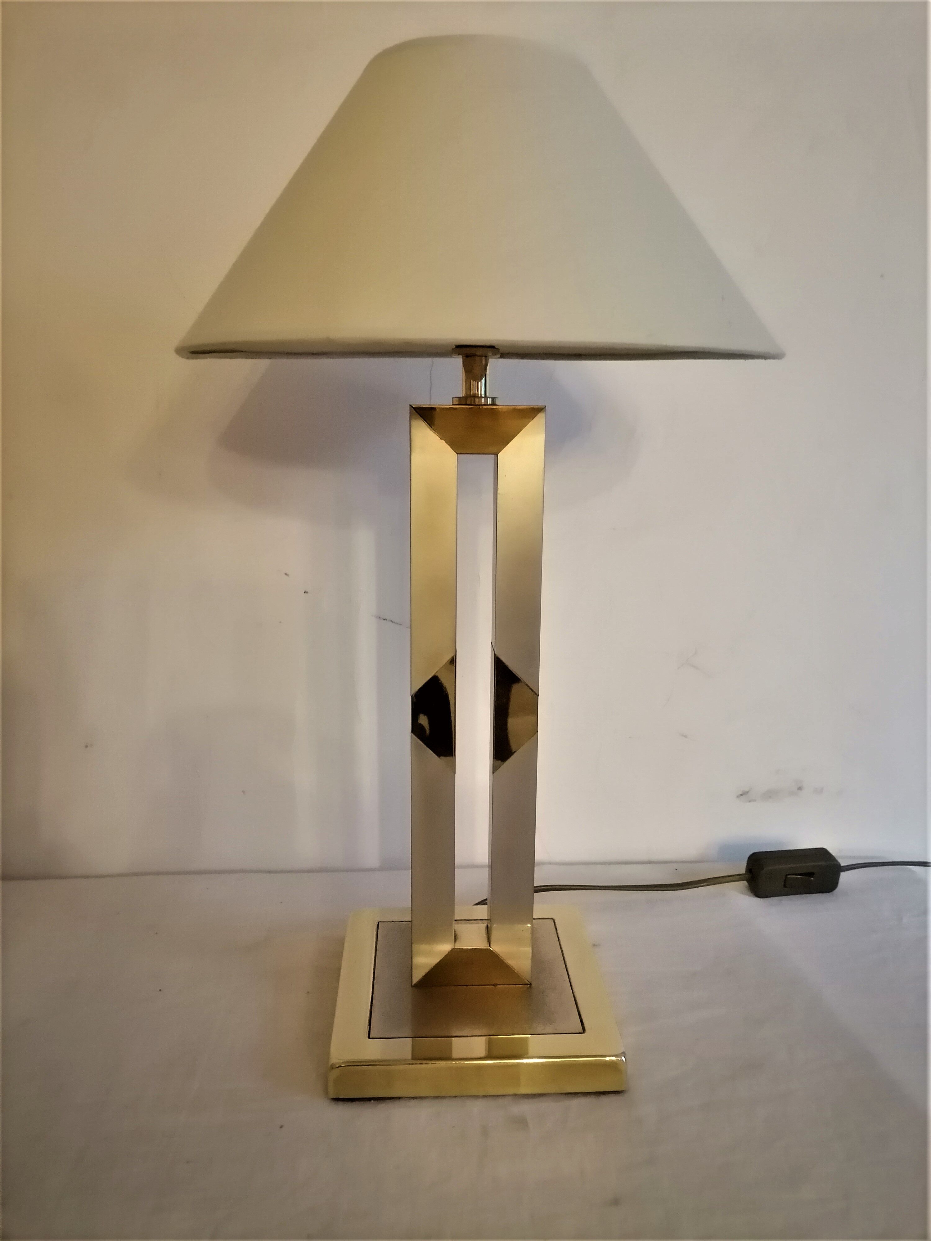 Modernist lamp. Brushed steel and brass.