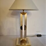 Modernist lamp. Brushed steel and brass.