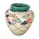 Vase in sandstone with decorations of diamonds and fruits