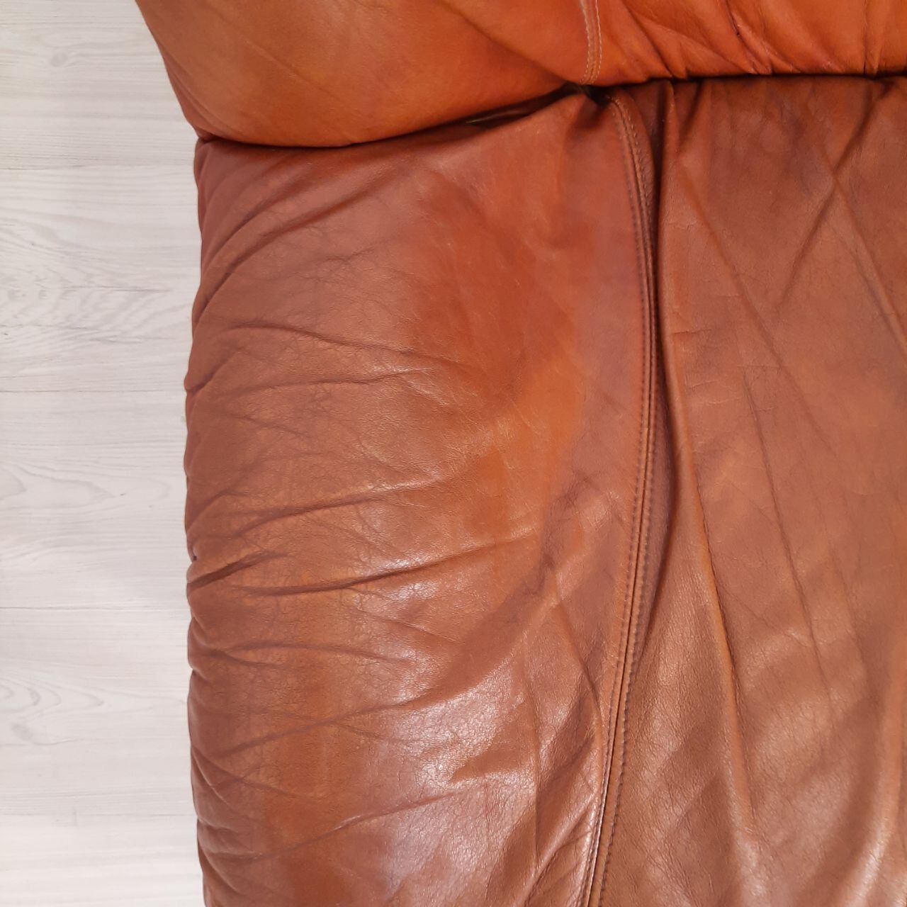 Four vintage armchairs, leather and fabric, 70s