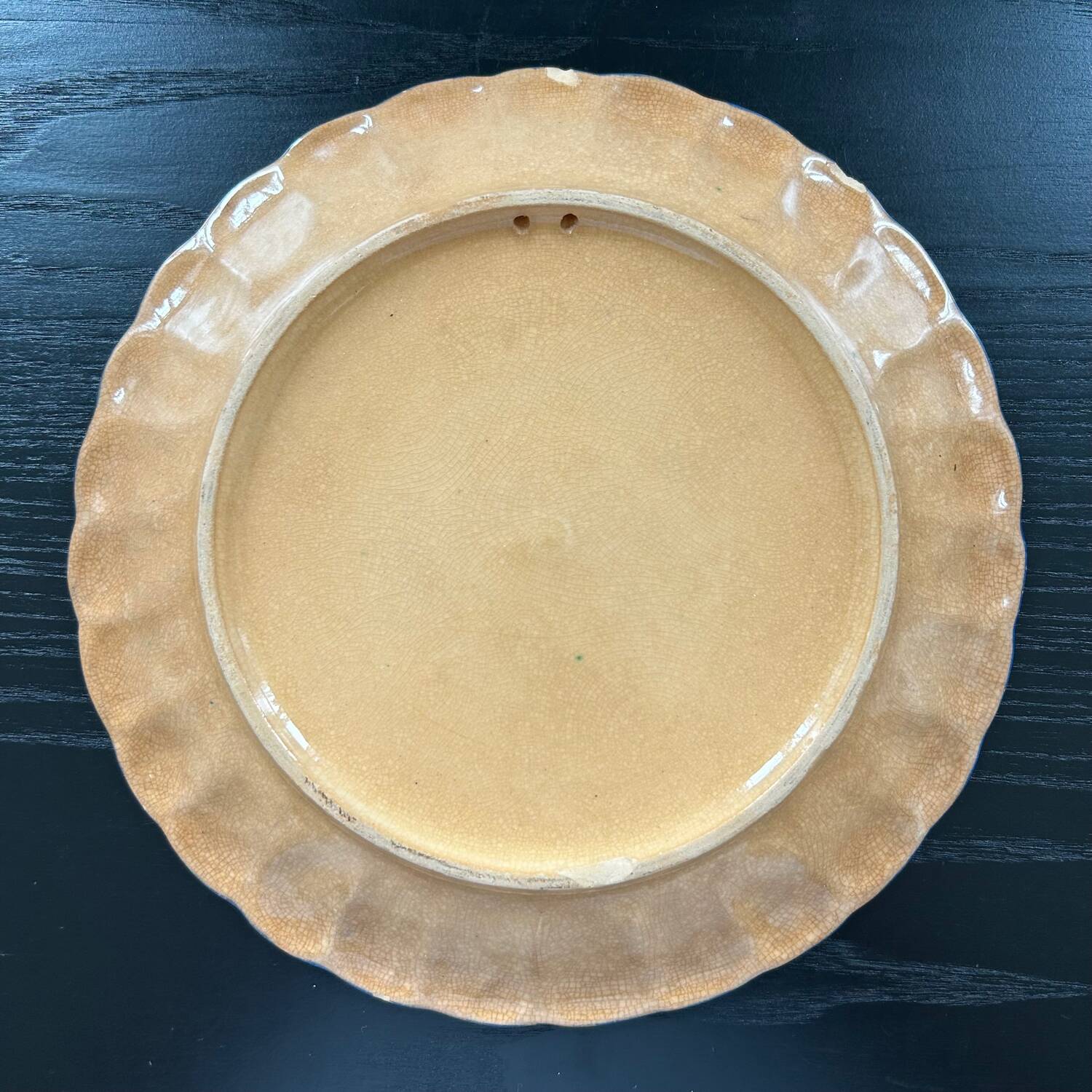 Old dish with blue floral decoration