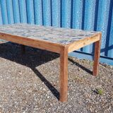 Teak dining table with illustrated top