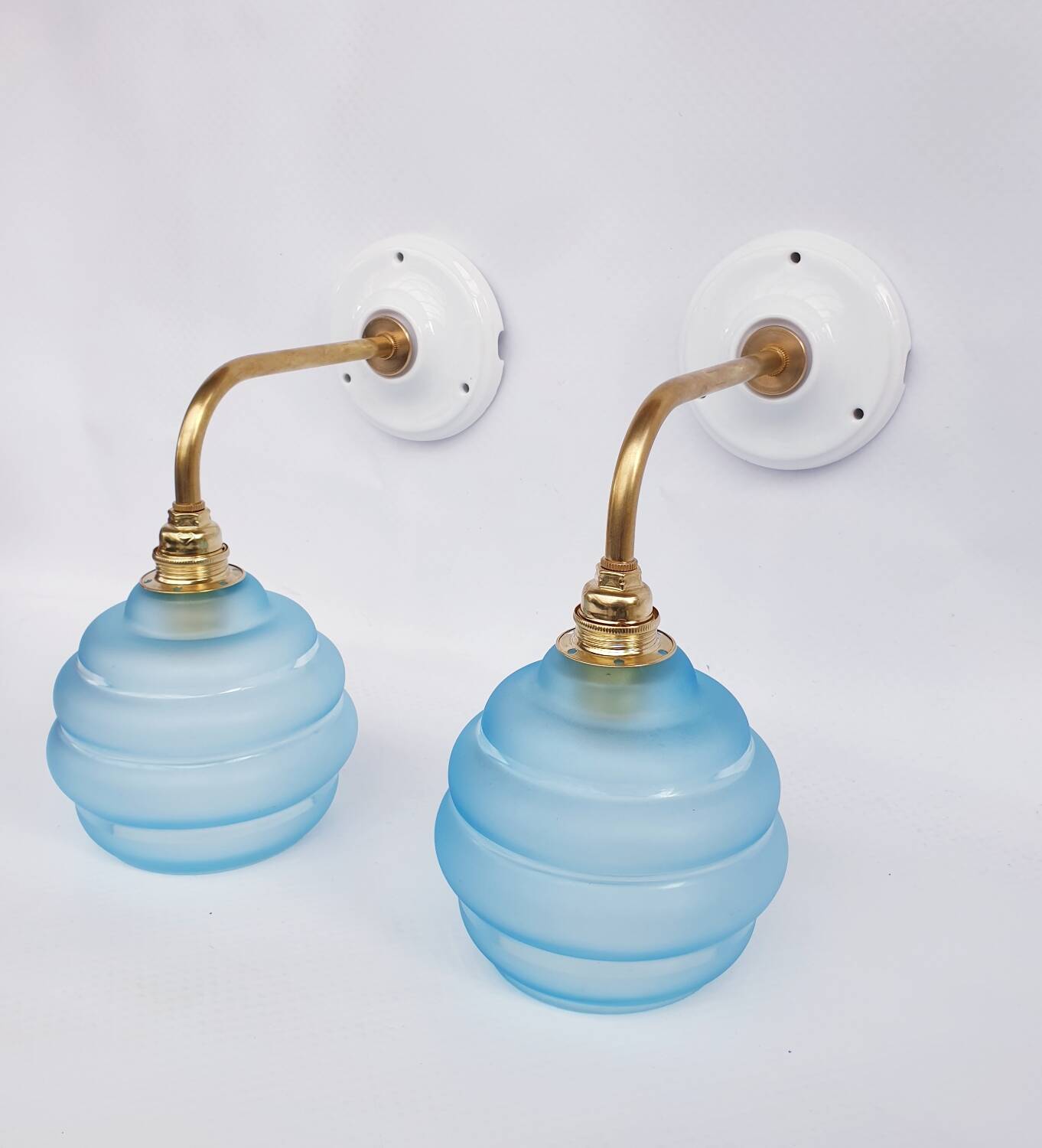 Vintage brass and blue glass wall lights