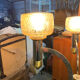 Three-burner metal and brass floor lamp