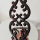 Antique wall candle holder in enamelled cast iron