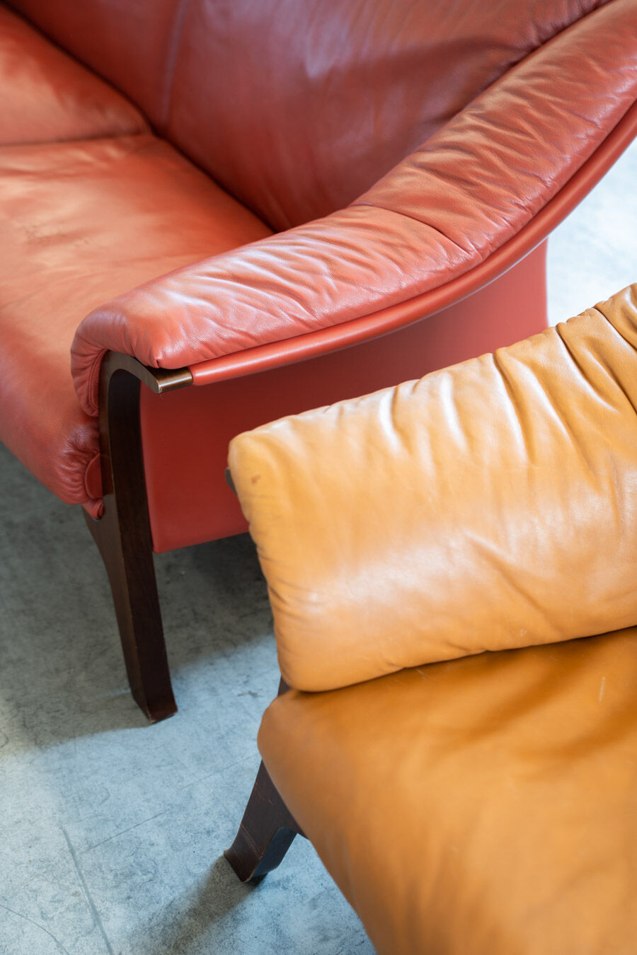 Frau sofas in cognac and burgundy leather, 1980s/90s, set of 2