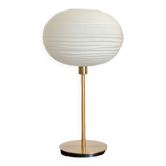 Table lamp made with an old globe in streaked white glass and a golden foot