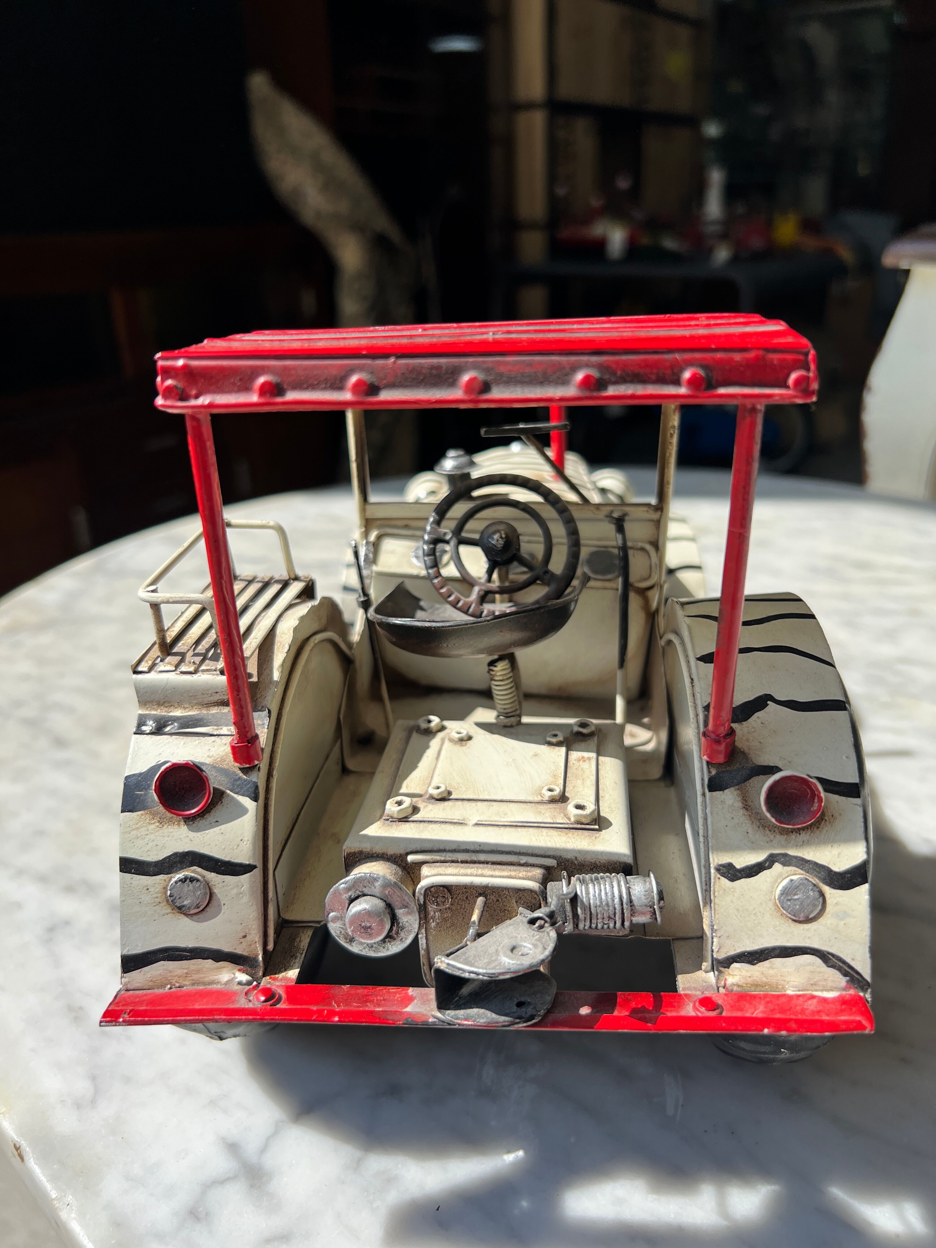 Old zebra metal tractor