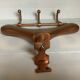 Coat rack gilded metal hanger varnished