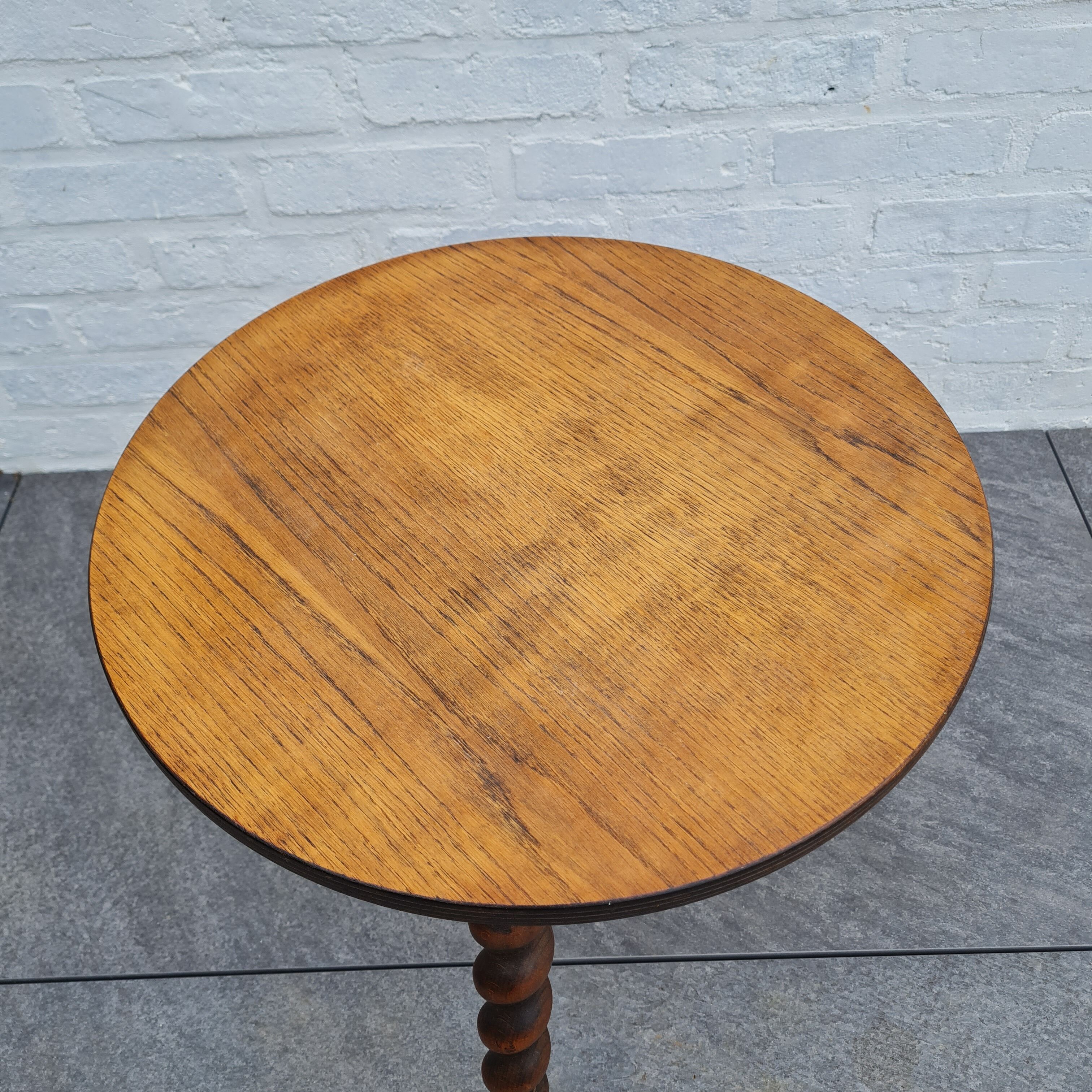 Wooden coffee table twisted tripod base