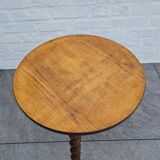 Wooden coffee table twisted tripod base