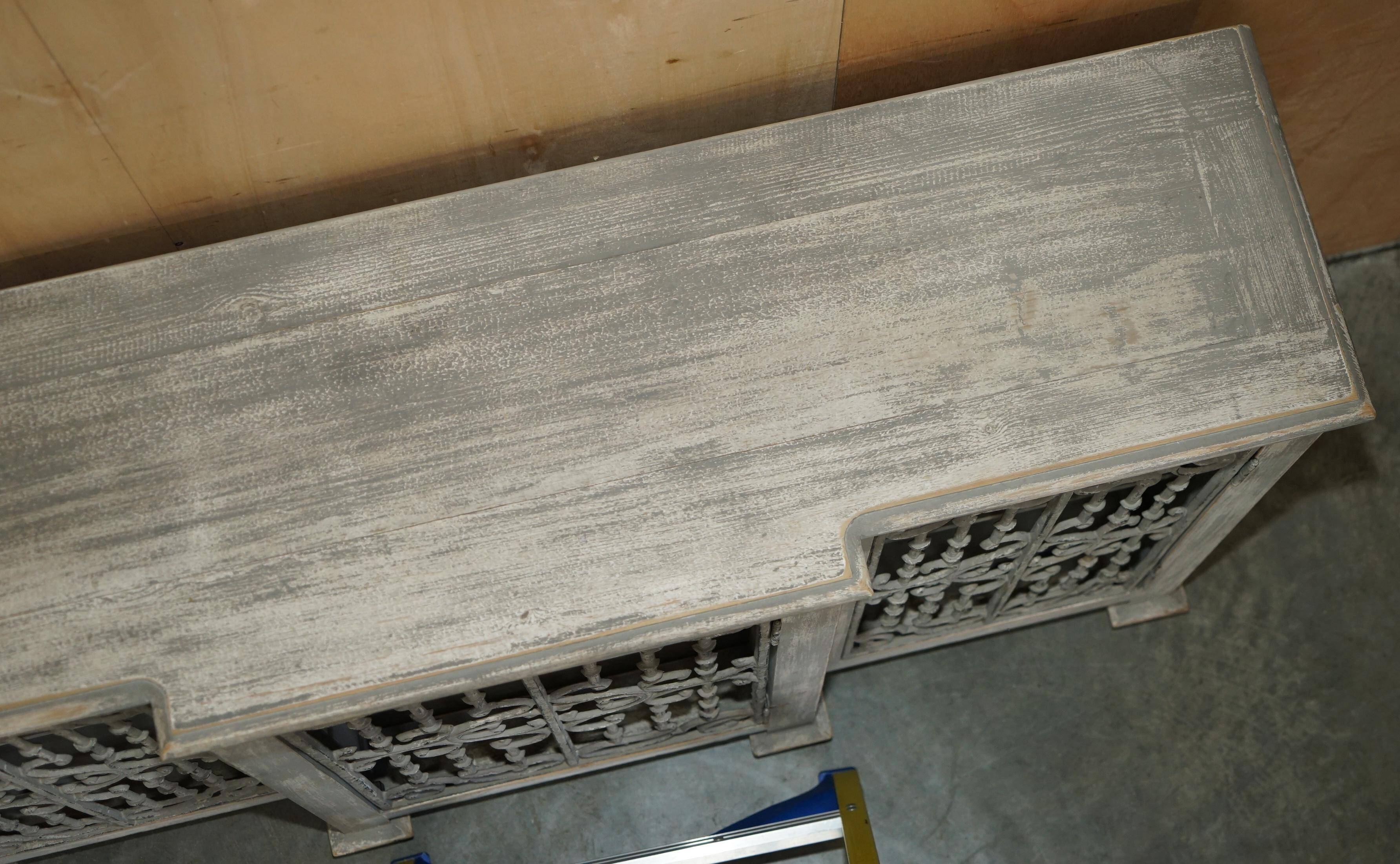 Vintage sideboard with wrought iron doors