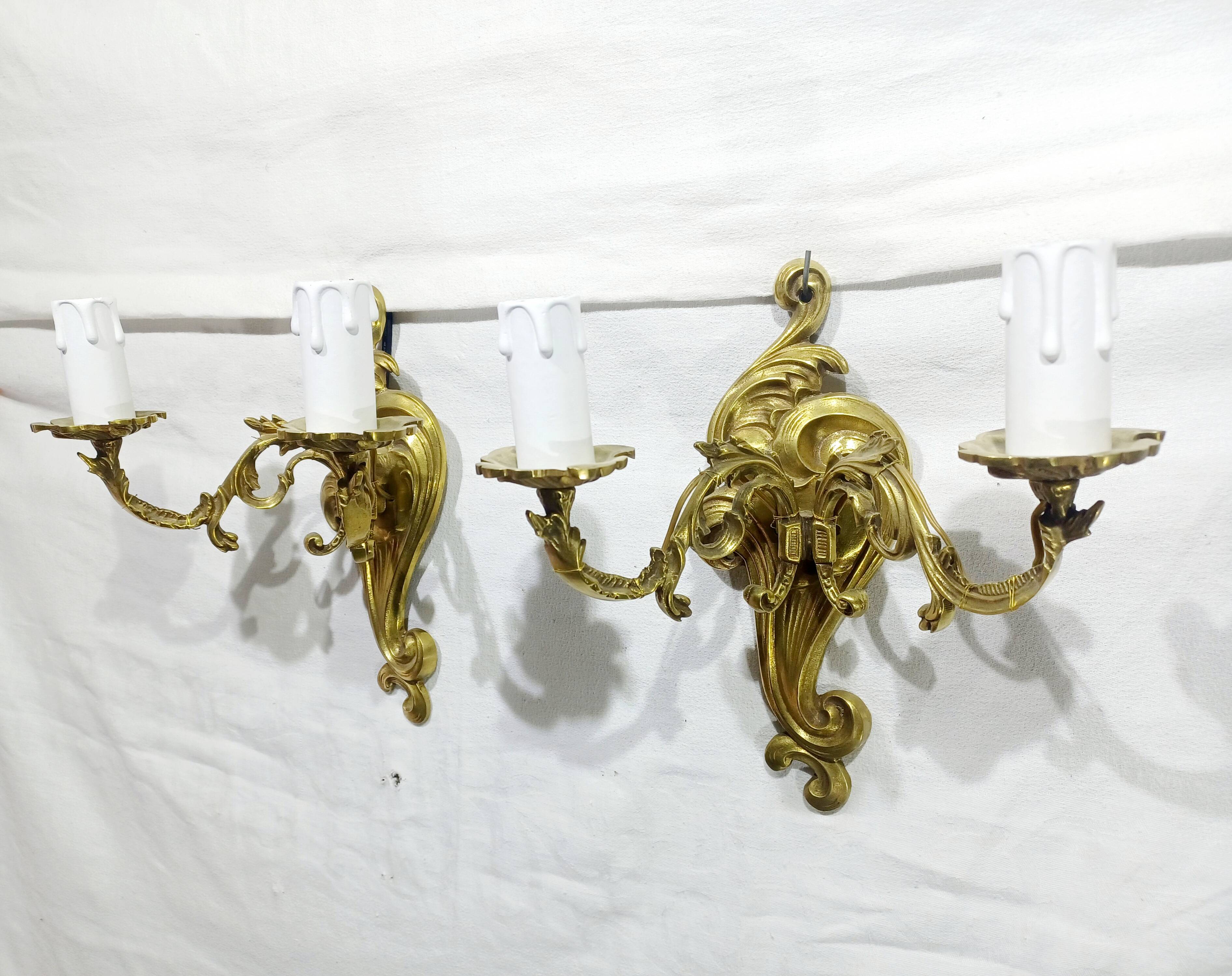 Pair of 2-light bronze wall lights, St. Louis XV
