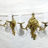 Pair of 2-light bronze wall lights, St. Louis XV
