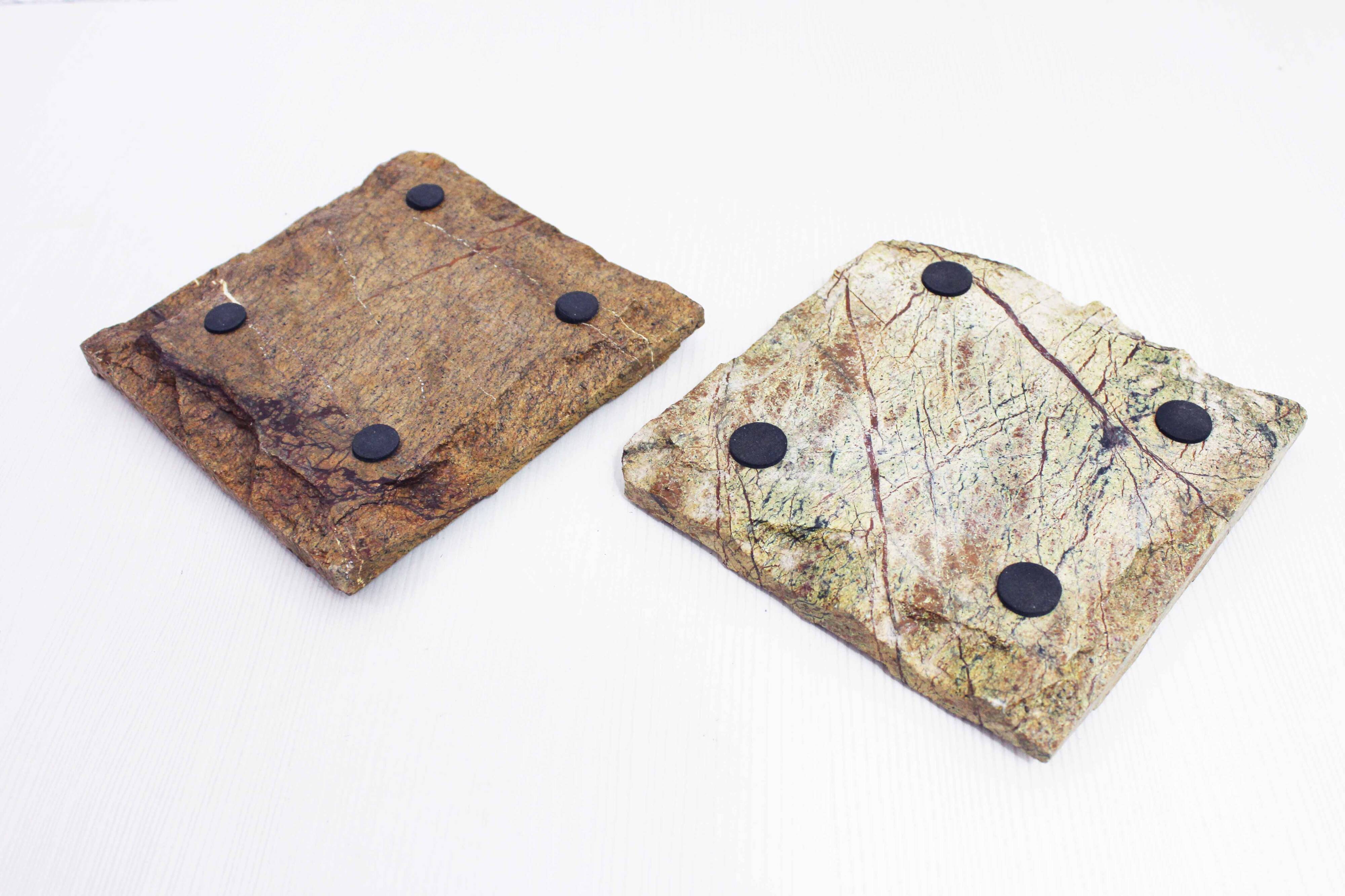 Pair of travertine candlesticks