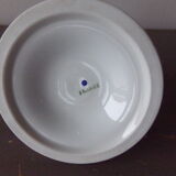Old candle holder in flowered porcelain